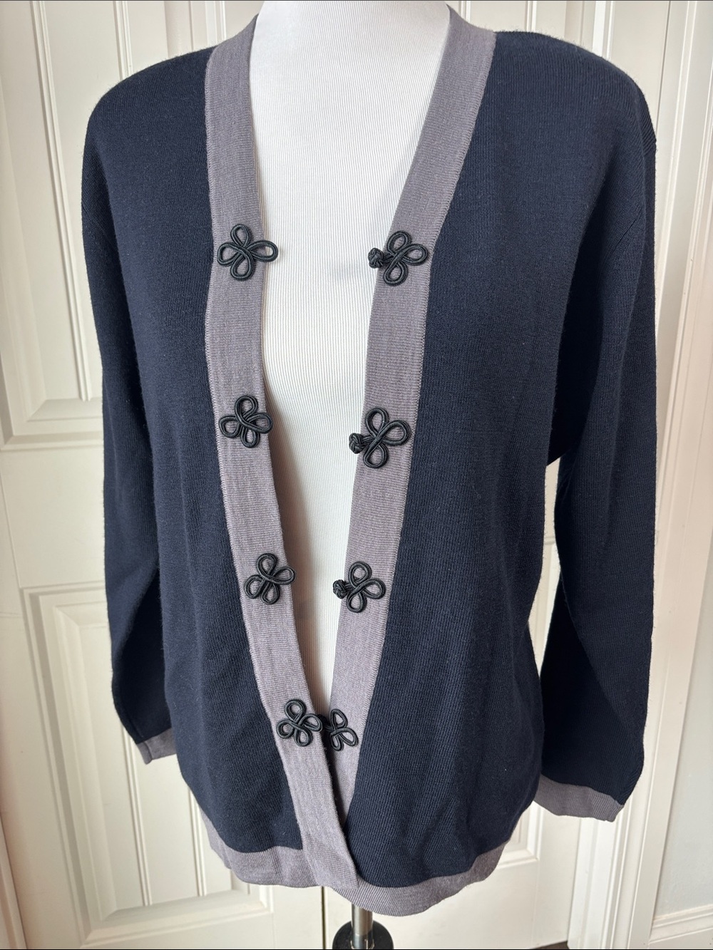JH Collectibles Navy Cardigan with Gray Trim and Decorative Knot Buttons